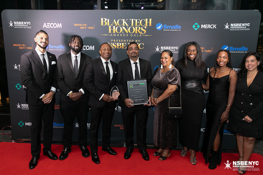 AECOM representatives with their recognition at the Black Tech Honors sponsors and partners backdrop