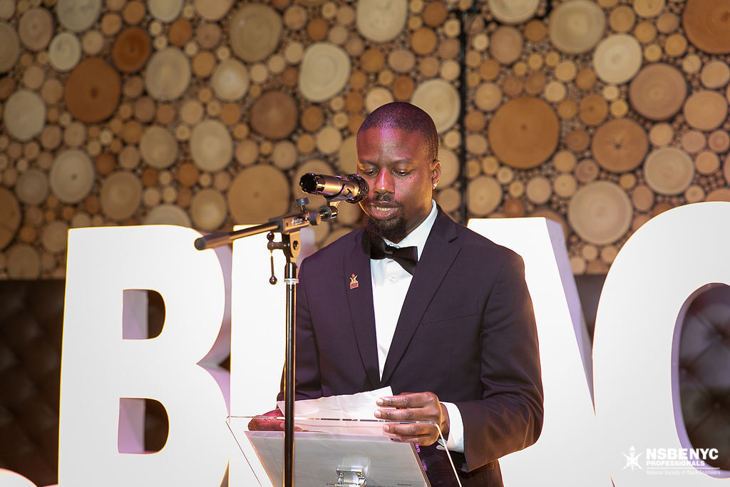 NSBE NYC leader speaking at the Black Tech Honors gala podium