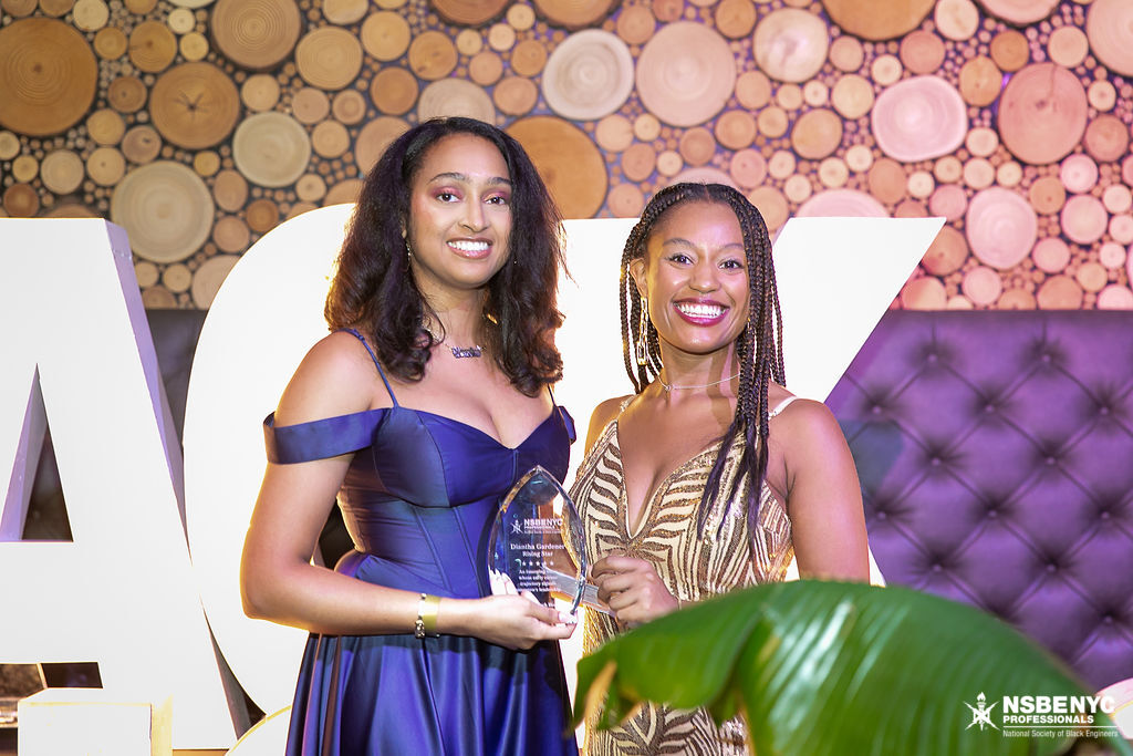 NSBE NYC award recipient and presenter together on the gala stage