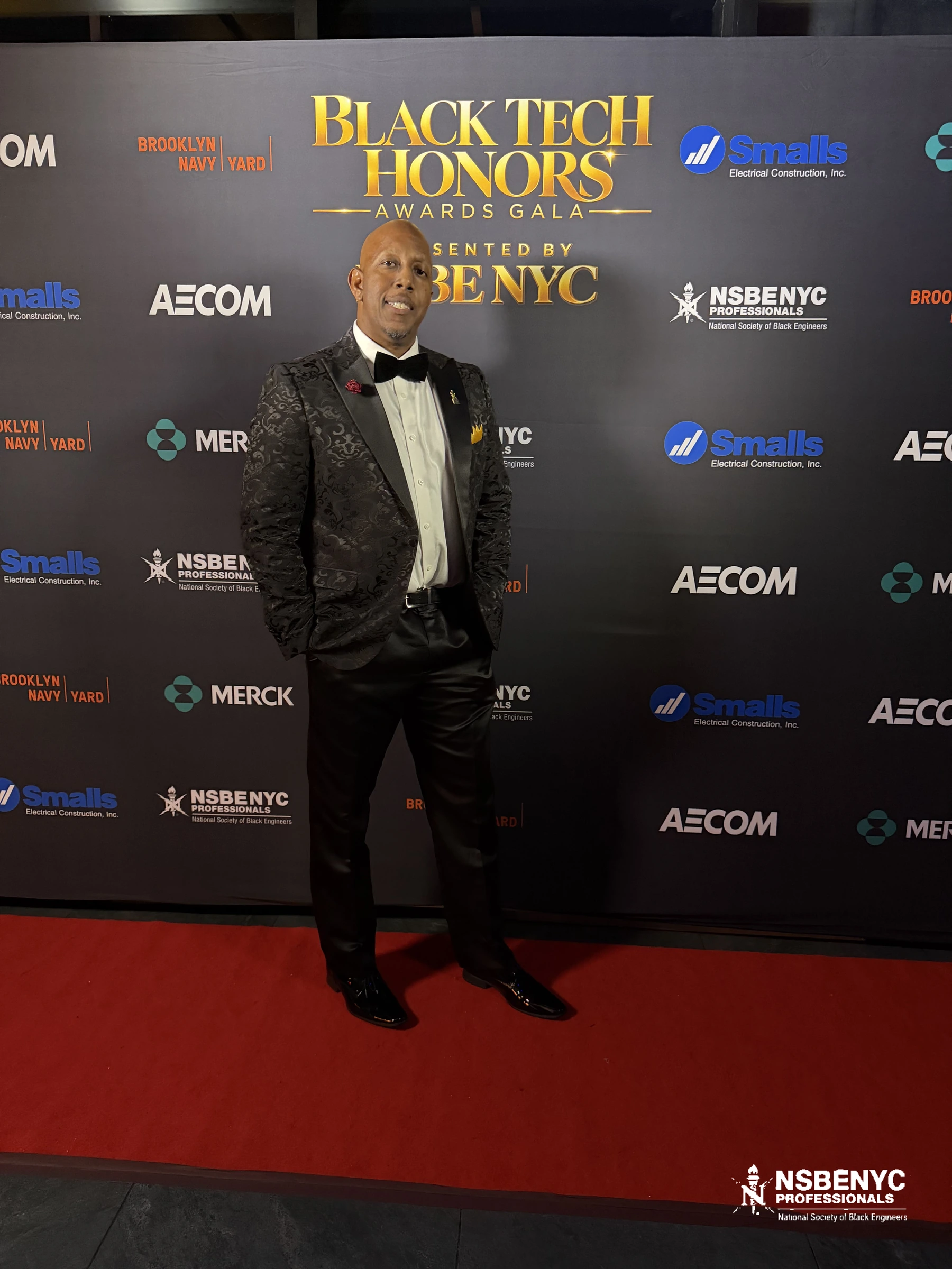 NSBE NYC professional in formalwear on the red carpet at the 2026 Black Tech Honors gala