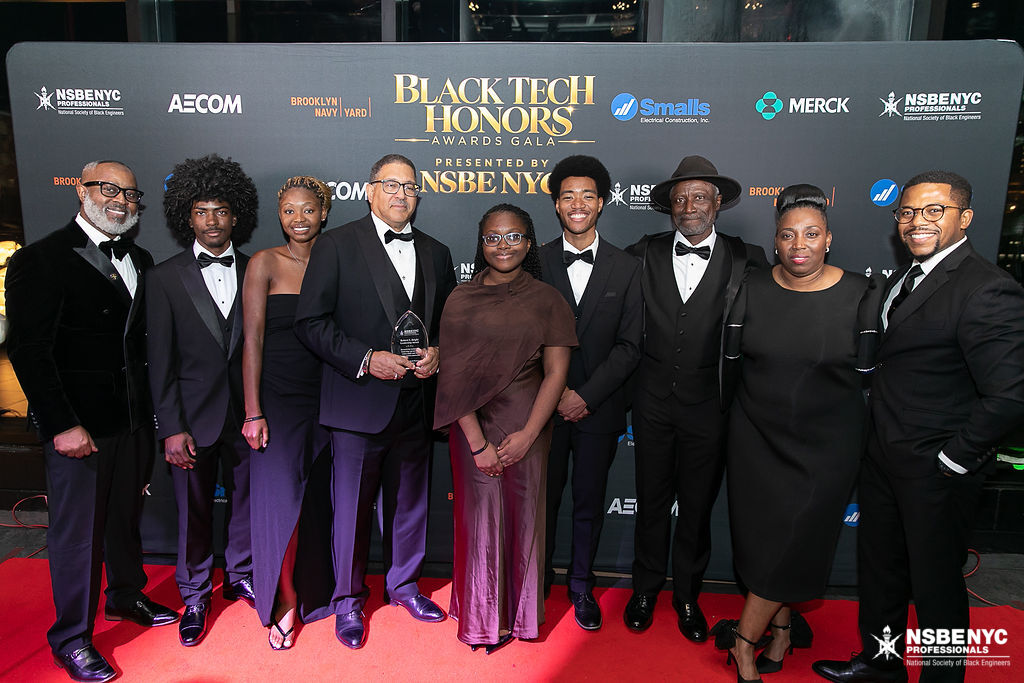 An honoree and family gathered for a celebratory portrait at the 2026 Black Tech Honors gala